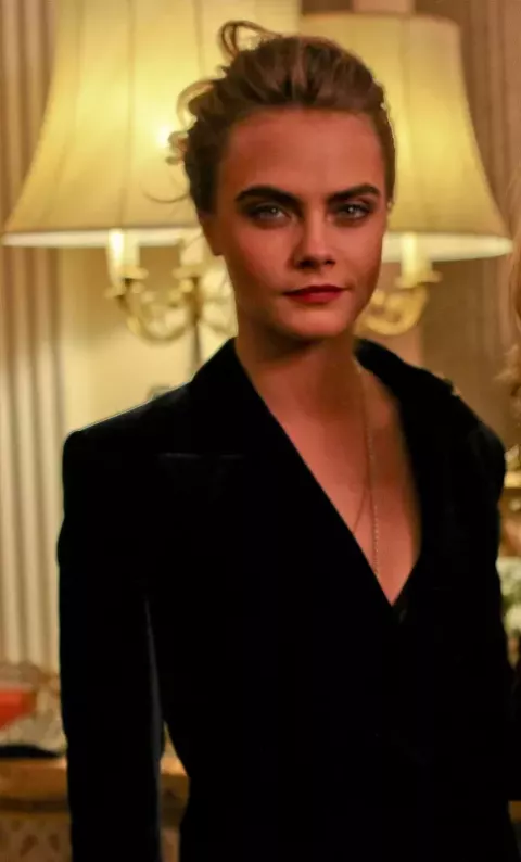Cara Delevingne at Vogue London Fashion Week reception held within Winfield House (2014)